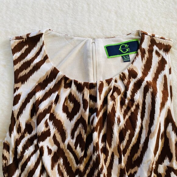 Women's Leopard Print Peplum Sleeveless Top Size XS Excellent Condition - Picture 2 of 10